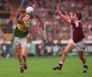 24 September 2000; Tomas O'Se of Kerry in action against Sean O'Domhnaill of Galway during the All-Ireland Senior Football Championship Final match between Kerry and Galway at Croke Park in Dublin. Photo by Ray McManus/Sportsfile