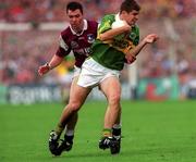 24 September 2000; Eamonn Fitzmaurice of Kerry in action against Sean O'Domhnaill of Galway during the All-Ireland Senior Football Championship Final match between Kerry and Galway at Croke Park in Dublin. Photo by Ray McManus/Sportsfile