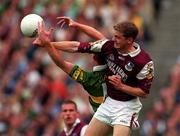 24 September 2000; Michael Donnellan of Galway in action against Liam Hassett of Kerry during the All-Ireland Senior Football Championship Final match between Kerry and Galway at Croke Park in Dublin. Photo by Ray McManus/Sportsfile