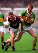 24 September 2000; Paul Clancy of Galway in action against Liam Hassett of Kerry during the All-Ireland Senior Football Championship Final match between Kerry and Galway at Croke Park in Dublin. Photo by Ray McManus/Sportsfile