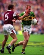 24 September 2000; Liam Hassett of Kerry in action against Declan Meehan of Galway during the All-Ireland Senior Football Championship Final match between Kerry and Galway at Croke Park in Dublin. Photo by Ray McManus/Sportsfile