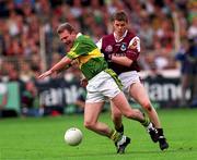 24 September 2000; Mike Hassett of Kerry in action against Niall Finnegan of Galway during the All-Ireland Senior Football Championship Final match between Kerry and Galway at Croke Park in Dublin. Photo by Ray McManus/Sportsfile