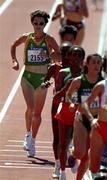 27 September 2000; Sonia O'Sullivan of Ireland, left, competing in the Women's 10,000m heat during day 13 of the Sydney Olympics in Sydney, Australia. Photo by Brendan Moran/Sportsfile