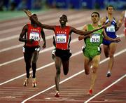 29 September 2000; Noah Ngeny of Kenya, centre, crosses the line ahead of second place Hicham El Guerrouj of Morocco, right, and third place Bernard Lagat of Kenya to win the men's 1500m race during day 15 of the 2000 Sydney Olympics at Sydney Olympic Park in Sydney, Australia. Photo by Brendan Moran/Sportsfile