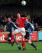 1 October 2000; Mark Hutchinson of Shelbourne in action against Michael O'Donnell, left, and John Martin of UCD during the Eircom League Premier Division match between UCD and Shelbourne at the Belfield Bowl in UCD, Dublin. Photo by David Maher/Sportsfile