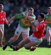 30 October 1999; Michael O'Sullivan of Cork in action against Seamus Moynihan of Kerry during the Church & General National Football League Division 1A Round 1 match between Cork and Kerry at Páirc Uí Rinn in Cork. Photo by Brendan Moran/Sportsfile