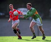 30 October 1999; Mike Hassett of Kerry in action against Philip Clifford of Cork during the Church & General National Football League Division 1A Round 1 match between Cork and Kerry at Páirc Uí Rinn in Cork. Photo by Brendan Moran/Sportsfile