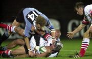 6 October 2000; Andy Ward of Ulster is tackled by Nick Walne, left, and Dan Baugh of Cardiff during the Heineken European Cup Pool 3 Round 1 match between Ulster and Cardiff at Ravenhill in Belfast. Photo by Matt Browne/Sportsfile