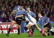 6 October 2000; Mike Voyle of Cardiff is tackled by Paddy Johns of Ulster during the Heineken European Cup Pool 3 Round 1 match between Ulster and Cardiff at Ravenhill in Belfast. Photo by Matt Browne/Sportsfile