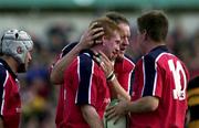 7 October 2000; Anthony Horgan of Munster is congratulated by team-mates Ronan O'Gara, right, and Mick Galwey after scoring a try during the Heineken Euopean Cup Pool 4 Round 1 match between Munster and Newport at Thomond Park in Limerick. Photo by Matt Browne/Sportsfile
