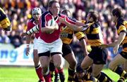 7 October 2000; Mick Galwey of Munster is tackled by Darren Edwards of Newport during the Heineken Euopean Cup Pool 4 Round 1 match between Munster and Newport at Thomond Park in Limerick. Photo by Matt Browne/Sportsfile