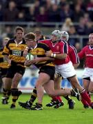 7 October 2000; Peter Buxton of Newport is tackled by Alan Quinlan of Munster during the Heineken Euopean Cup Pool 4 Round 1 match between Munster and Newport at Thomond Park in Limerick. Photo by Matt Browne/Sportsfile