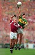 7 October 2000; Aodan Mac Gearailt of Kerry in action against Sean Og de Paor of Galway during the Bank of Ireland All-Ireland Senior Football Championship Final Replay match between Kerry and Galway at Croke Park in Dublin. Photo by Brendan Moran/Sportsfile