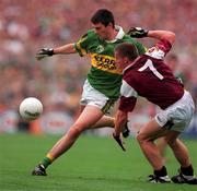 7 October 2000; Aodan Mac Gearailt of Kerry in action against Sean Og de Paor of Galway during the Bank of Ireland All-Ireland Senior Football Championship Final Replay match between Kerry and Galway at Croke Park in Dublin. Photo by Brendan Moran/Sportsfile