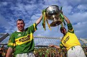 7 October 2000; Kerry captain Seamus Moynihan, left, and Peter O'Leary lift the Sam Maguire cup following the Bank of Ireland All-Ireland Senior Football Championship Final Replay match between Kerry and Galway at Croke Park in Dublin. Photo by Brendan Moran/Sportsfile