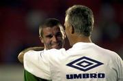 7 October 2000; Roy Keane of Republic of Ireland, left, celebrates with manager Mick McCarthy following the World Cup 2002 Qualification Group 2 match between Portugal and Republic of Ireland at the Estádio da Luz in Lisbon, Portugal. Photo by David Maher/Sportsfile