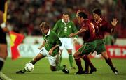 7 October 2000; Jason McAteer of Republic of Ireland in action against Dimas of Portugal during the World Cup 2002 Qualification Group 2 match between Portugal and Republic of Ireland at the Estádio da Luz in Lisbon, Portugal. Photo by David Maher/Sportsfile