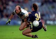 8 October 2000; Peter Canavan of Ireland is tackled by David King of Australia during the International Rules Series First Test match between Ireland and Australia at Croke Park in Dublin. Photo by Ray McManus/Sportsfile