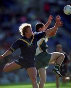 8 October 2000; Nathan Brown of Australia in action against Sean Martin Lockhart of Ireland during the International Rules Series First Test match between Ireland and Australia at Croke Park in Dublin. Photo by Ray McManus/Sportsfile
