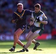 8 October 2000; Paul McGrane of Ireland in action against Shane Woewodin of Australia during the International Rules Series First Test match between Ireland and Australia at Croke Park in Dublin. Photo by Ray McManus/Sportsfile