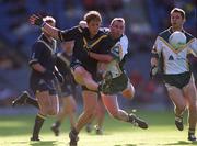8 October 2000; Trent Croad of Australia is tackled by Glenn Ryan of Ireland during the International Rules Series First Test match between Ireland and Australia at Croke Park in Dublin. Photo by Ray McManus/Sportsfile