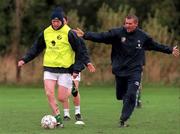 9 October 2000; Steve Staunton, left, and Roy Keane during a Republic of Ireland squad training session at the AUL Complex in Clonshaugh, Dublin. Photo by David Maher/Sportsfile