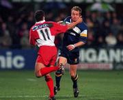 13 October 2000; Denis Hickie of Leinster is tackled by Stuart Legg of Biarritz during the Heineken Cup Pool 1 match between Leinster and Biarritz at Donnybrook Stadium in Dublin. Photo by Brendan Moran/Sportsfile