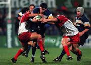 13 October 2000; Shane Horgan of Leinster is tackled by Laurent Mazas, left, and Christophe Milheres of Biarritz during the Heineken Cup Pool 1 match between Leinster and Biarritz at Donnybrook Stadium in Dublin. Photo by Brendan Moran/Sportsfile