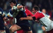 13 October 2000; Shane Horgan of Leinster is tackled by Scott Keith of Biarritz during the Heineken Cup Pool 1 match between Leinster and Biarritz at Donnybrook Stadium in Dublin. Photo by Brendan Moran/Sportsfile