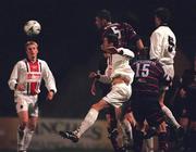 13 October 2000; Darragh Maguire of St Patrick's Athletic in action against Darren O'Keeffe, left, and Shaun Maher of Bohemians during the Eircom League Premier Division match between Bohemians v St Patrick's Athletic at Dalymount Park in Dublin. Photo by David Maher/Sportsfile