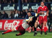 13 October 2000; Brian O'Meara of Leinster is tackled by Christophe Milheres of Biarritz during the Heineken Cup Pool 1 match between Leinster and Biarritz at Donnybrook Stadium in Dublin. Photo by Brendan Moran/Sportsfile