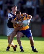 14 October 2000; Karl Donnelly of Na Fianna in action against Darren Magee of Kilmacud Crokes during the Evening Herald Dublin Senior Football Championship Final match between Na Fianna and Kilmacud Crokes at Parnell Park in Dublin. Photo by Ray McManus/Sportsfile