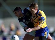 14 October 2000; Kieran McGeeney of Na Fianna in action against Darren Magee of Kilmacud Crokes during the Evening Herald Dublin Senior Football Championship Final match between Na Fianna and Kilmacud Crokes at Parnell Park in Dublin. Photo by Ray McManus/Sportsfile