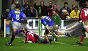 14 October 2000; Dominic Crotty of Munster goes over to score a try despire Phillippe Garrigues, right, and Francis Plissom of Castres during the Heineken Cup Pool 1 match between Castres and Munster at the Stade Pierre Antoine in Castres, France. Photo by Matt Browne/Sportsfile