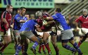 14 October 2000; Alan Quinlan of Munster is tackled by Dragon Dima, left, and Ugo Mola of Castres during the Heineken Cup Pool 1 match between Castres and Munster at the Stade Pierre Antoine in Castres, France. Photo by Matt Browne/Sportsfile