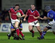 14 October 2000; John Kelly of Munster is tackled by Jose Diaz of Castres during the Heineken Cup Pool 1 match between Castres and Munster at the Stade Pierre Antoine in Castres, France. Photo by Matt Browne/Sportsfile
