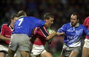 14 October 2000; Jason Holland of Munster is tackled by Jose Diaz of Castres during the Heineken Cup Pool 1 match between Castres and Munster at the Stade Pierre Antoine in Castres, France. Photo by Matt Browne/Sportsfile