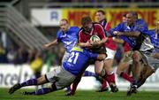14 October 2000; Anthony Horgan of Munster is tackled by Adam Larkin, left, and Jose Diaz of Castres during the Heineken Cup Pool 1 match between Castres and Munster at the Stade Pierre Antoine in Castres, France. Photo by Matt Browne/Sportsfile