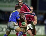 14 October 2000; Frank Sheahan of Munster is tackled by Alexandre Albouy of Castres during the Heineken Cup Pool 1 match between Castres and Munster at the Stade Pierre Antoine in Castres, France. Photo by Matt Browne/Sportsfile