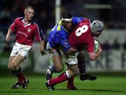 14 October 2000; Anthony Foley of Munster is tackled by Arnaud Costes of Castres during the Heineken Cup Pool 1 match between Castres and Munster at the Stade Pierre Antoine in Castres, France. Photo by Matt Browne/Sportsfile