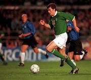 11 October 2000; Kevin Kilbane of Ireland in action against Martin Reim of Estonia during the World Cup 2002 Qualifying group 2 match between Republic of Ireland and Estonia at Lansdowne Road in Dublin. Photo by David Maher/Sportsfile