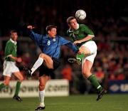 11 October 2000; Richard Dunne of Ireland in action against Andres Oper of Estonia during the World Cup 2002 Qualifying group 2 match between Republic of Ireland and Estonia at Lansdowne Road in Dublin. Photo by David Maher/Sportsfile