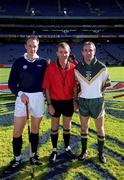 15 October 2000; Referee Dickie Murphy with captains Rory Fraser of Scotland and DJ Carey of Ireland prior to the Hurling Shinty International match between Ireland and Scotland at Croke Park in Dublin. Photo Ray McManus/Sportsfile