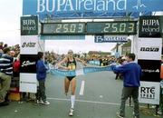 15 October 2000; Paula Radcliffe of Great Britain crosses the line to win the Loughrea 5 Mile Road Race in Loughrea, Galway. Photo by Damien Eagers/Sportsfile