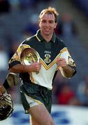 15 October 2000; DJ Carey of Ireland with the trophy following the Hurling Shinty International match between Ireland and Scotland at Croke Park in Dublin. Photo Ray McManus/Sportsfile