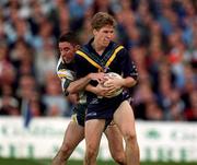 15 October 2000; Luke Power of Australia in action against Anthony Rainbow of Ireland during the International Rules Series Second Test match between Ireland and Australia at Croke Park in Dublin. Photo by Brendan Moran/Sportsfile