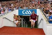 9 August 2015; Kilkenny's Conor Doheny and Galway's Andrew Greaney make their way to the field for the start of extra-time. Electric Ireland GAA Hurling All-Ireland Minor Championship, Semi-Final, Kilkenny v Galway. Croke Park, Dublin. Picture credit: Piaras Ó Mídheach / SPORTSFILE