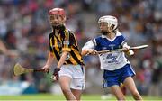 9 August 2015; Eva Collins, St Canices Ed, Kilkenny, in action against Cora Kenny, New Inn NS, Ballinasloe, Galway, representing Waterford, during the Cumann na mBunscol INTO Respect Exhibition Go Games 2015 at Kilkenny v Waterford - GAA Hurling All-Ireland Senior Championship Semi-Final. Croke Park, Dublin. Picture credit: Ray McManus / SPORTSFILE