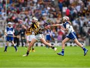 9 August 2015; Fianna Byrne, Killanure NS, Mountrath, Laois, representing Kilkenny, in action against Gráinne O’Reilly, Emo NS, Portlaoise, Laois, representing Waterford, during the Cumann na mBunscol INTO Respect Exhibition Go Games 2015 at Kilkenny v Waterford - GAA Hurling All-Ireland Senior Championship Semi-Final. Croke Park, Dublin. Picture credit: Ray McManus / SPORTSFILE