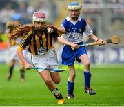 9 August 2015; Kate Crilly, Foley PS, Tassagh, Armagh, representing Kilkenny, in action against Jessica Halley, Fenor NS, Tramore, Waterford, representing Waterford, during the Cumann na mBunscol INTO Respect Exhibition Go Games 2015 at Kilkenny v Waterford - GAA Hurling All-Ireland Senior Championship Semi-Final. Croke Park, Dublin. Picture credit: Piaras Ó Mídheach / SPORTSFILE